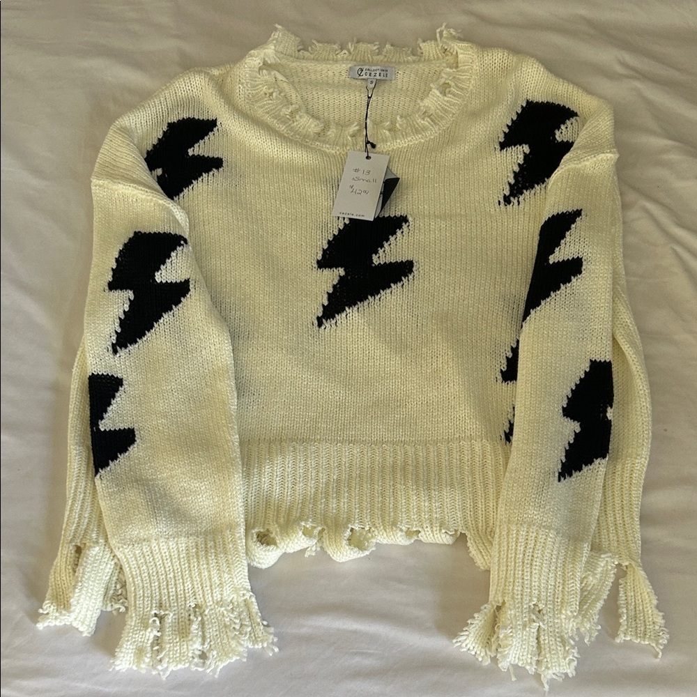 Cream Sweater with Black Lightning Pattern